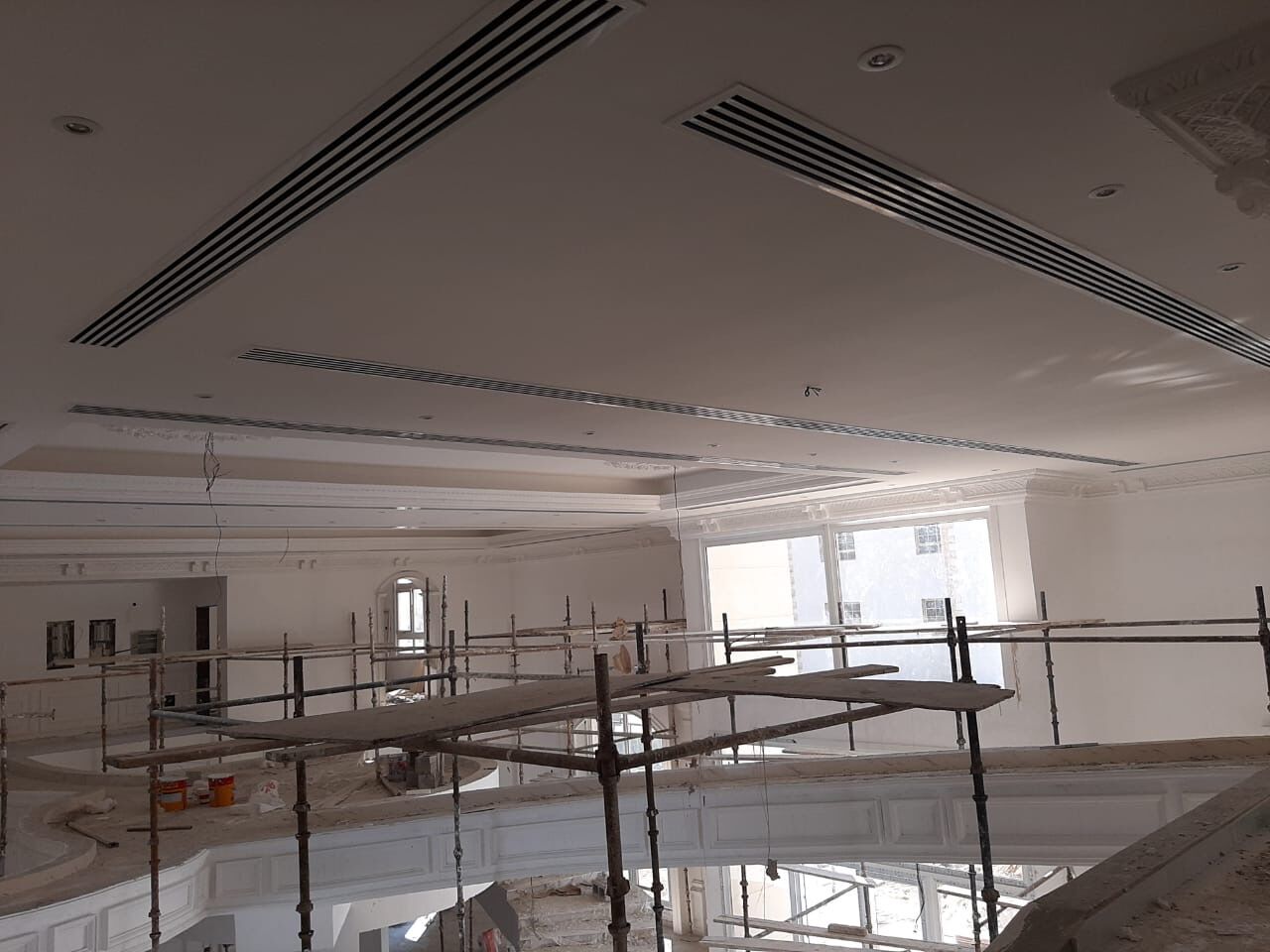 Linear slot diffusers installed in residential villa ceiling